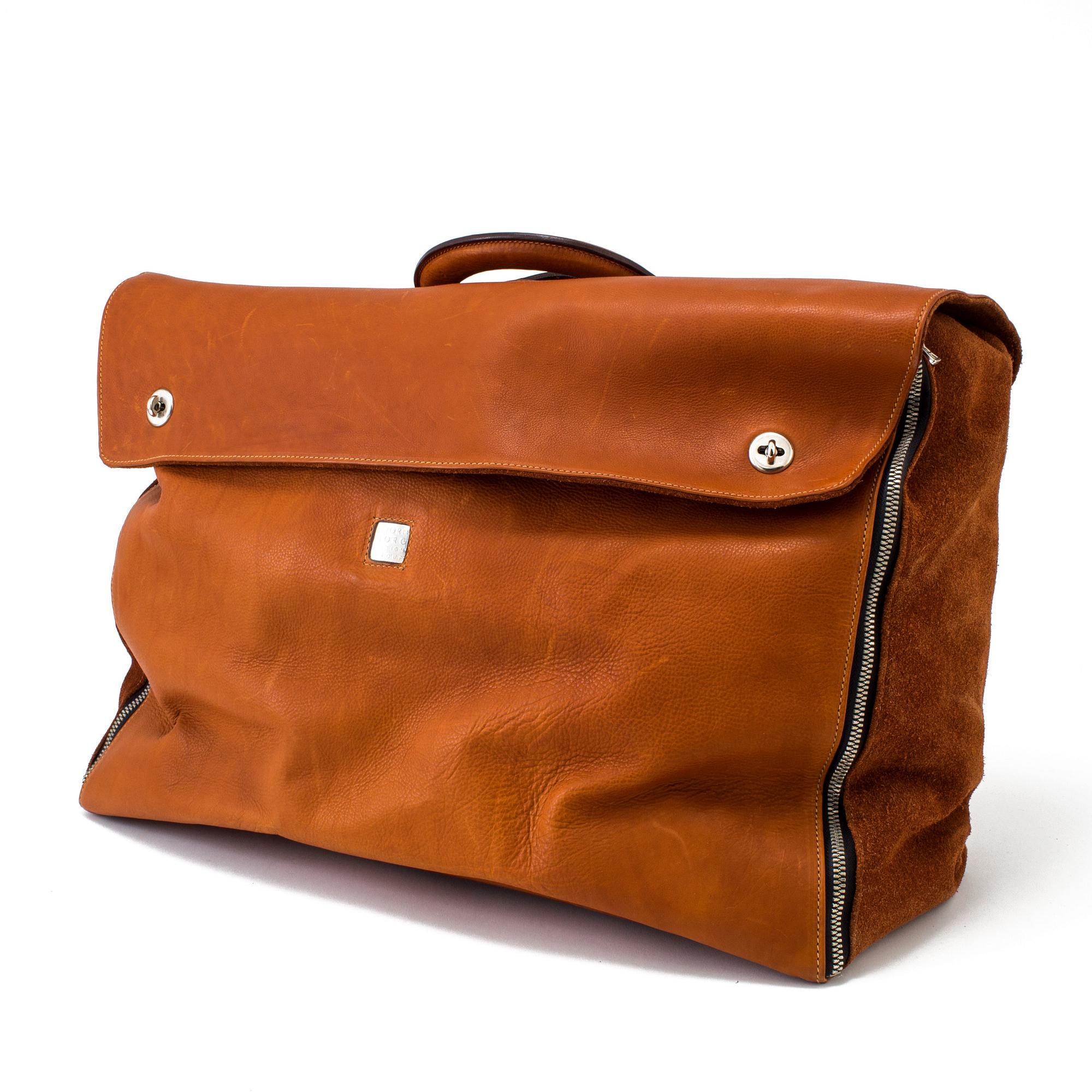 A brown leather and suede weekendbag by Björn Borg, 1980's.