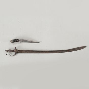 A tulwar and a knife from India, 19th century.