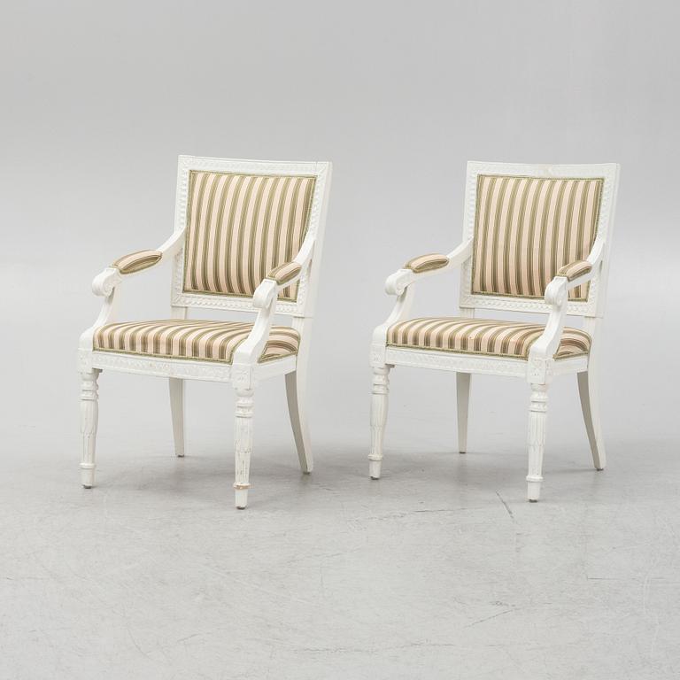 A pair of Gustavian style armchairs, around 1900.
