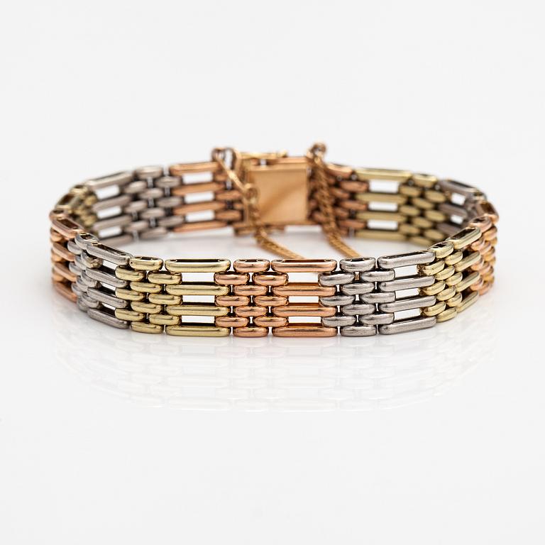 A 14K gold and platinum bracelet. Russian hallmarks.