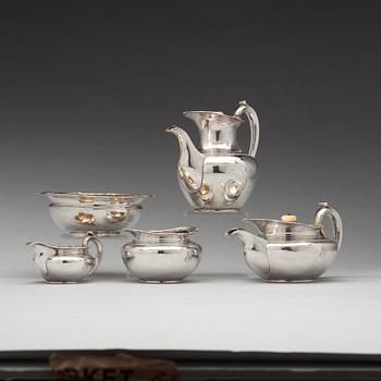 A Russian 19th century parcel-gilt silver tea- and coffee-set, unidentified makers mark FK, St Petersburg 1837.