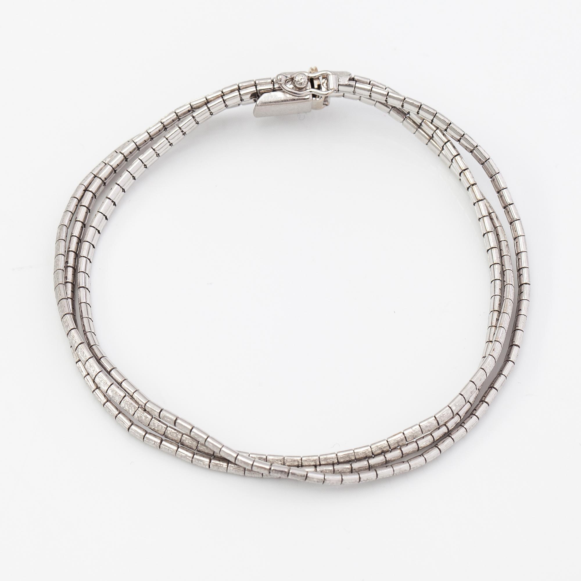 A 14K white gold bracelet. Import marked TIllander, Helsinki 1967.