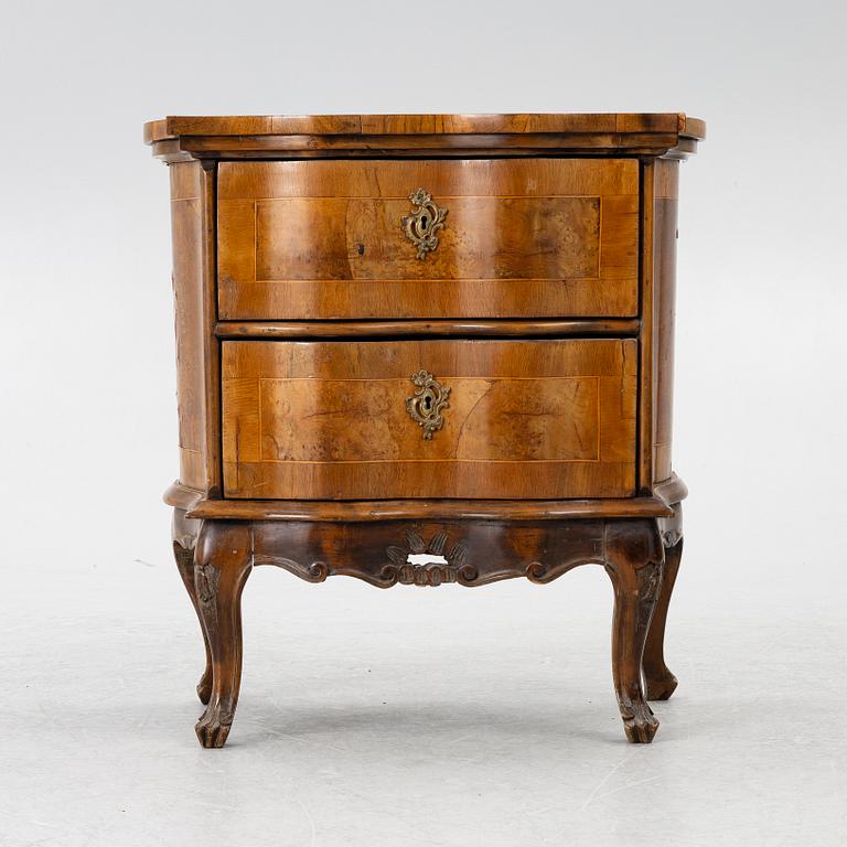 A small neo-Rococo chest of drawers, 19th century.
