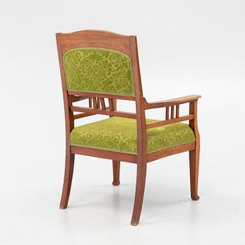 An Art Nouveau stained beech armchair, early 20th Century.