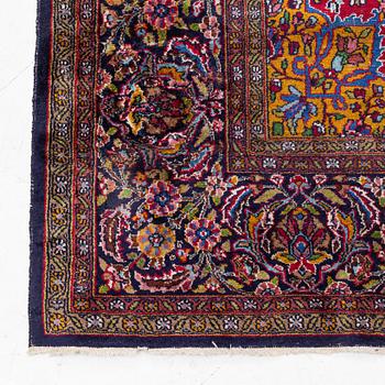 A carpet, oriental silk, approx. 269 x 184 cm.