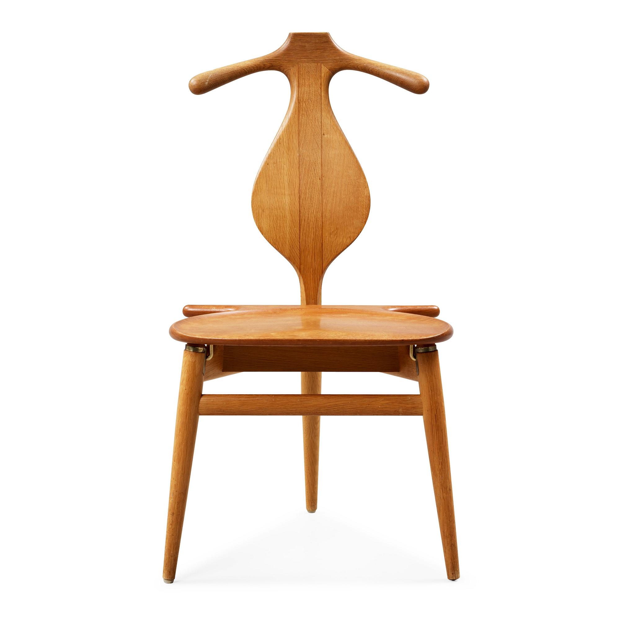 A Hans J Wegner 'Jakkens Hvile' teak chair, Johannes Hansen, Denmark.