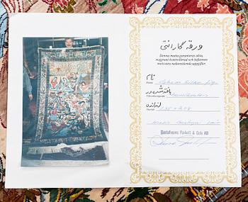 A silk Qum rug, Central Persia, signed, c. 135 x 208 cm.