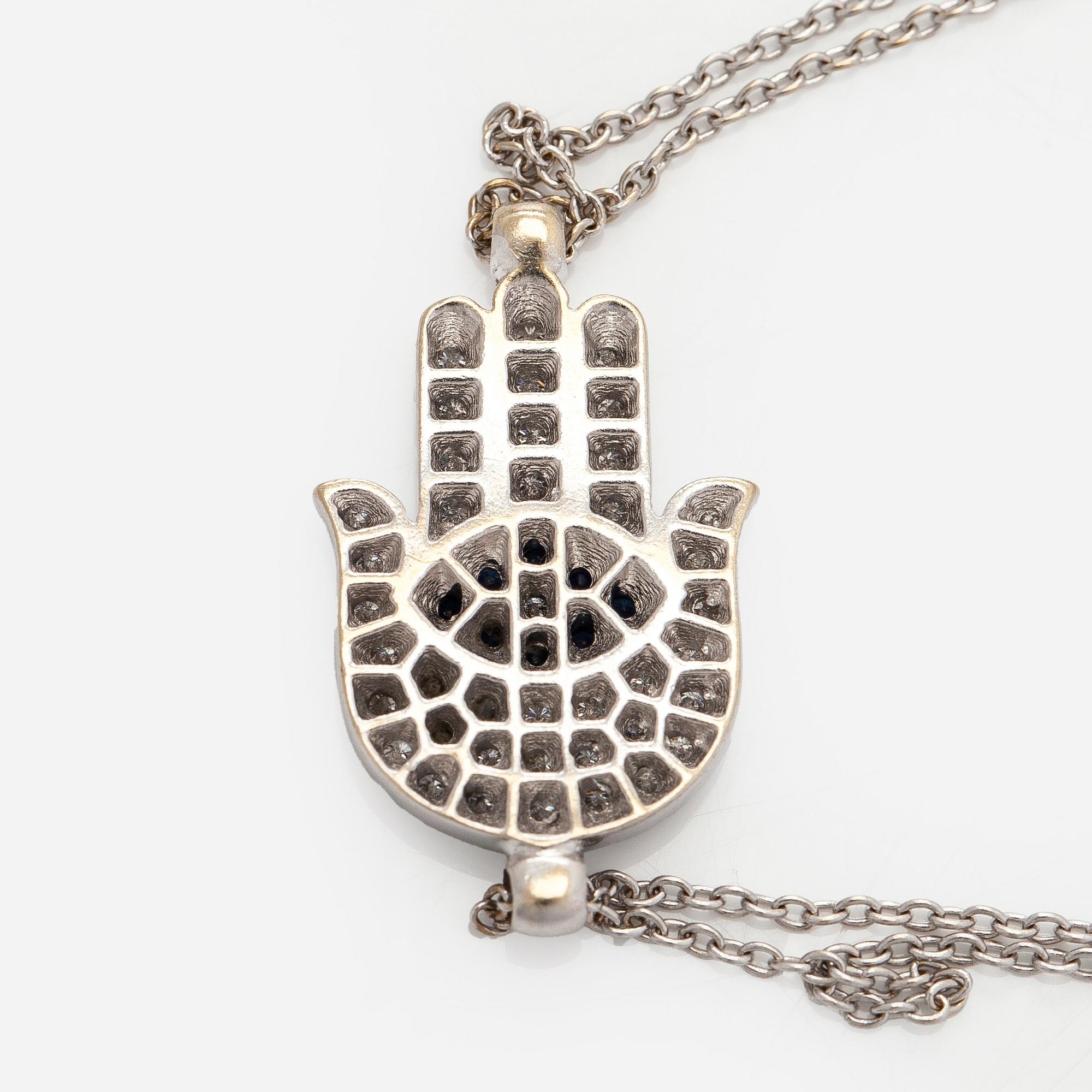 Armband, 18K guld med diamanter och safirer, "Fatimas hand".