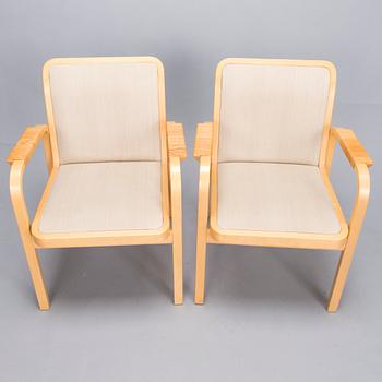 ALVAR AALTO, Pair of model 'E45' armchairs for Artek, late 20th Century.