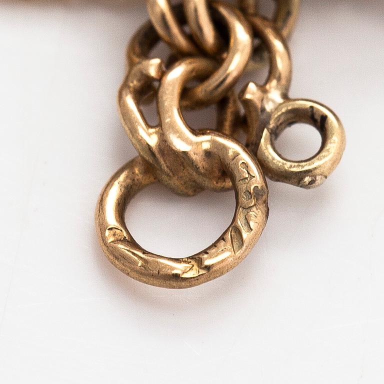 Armband, bismarck ked, 14K guld, med berlocker i form av ägg, Finska stämplar.