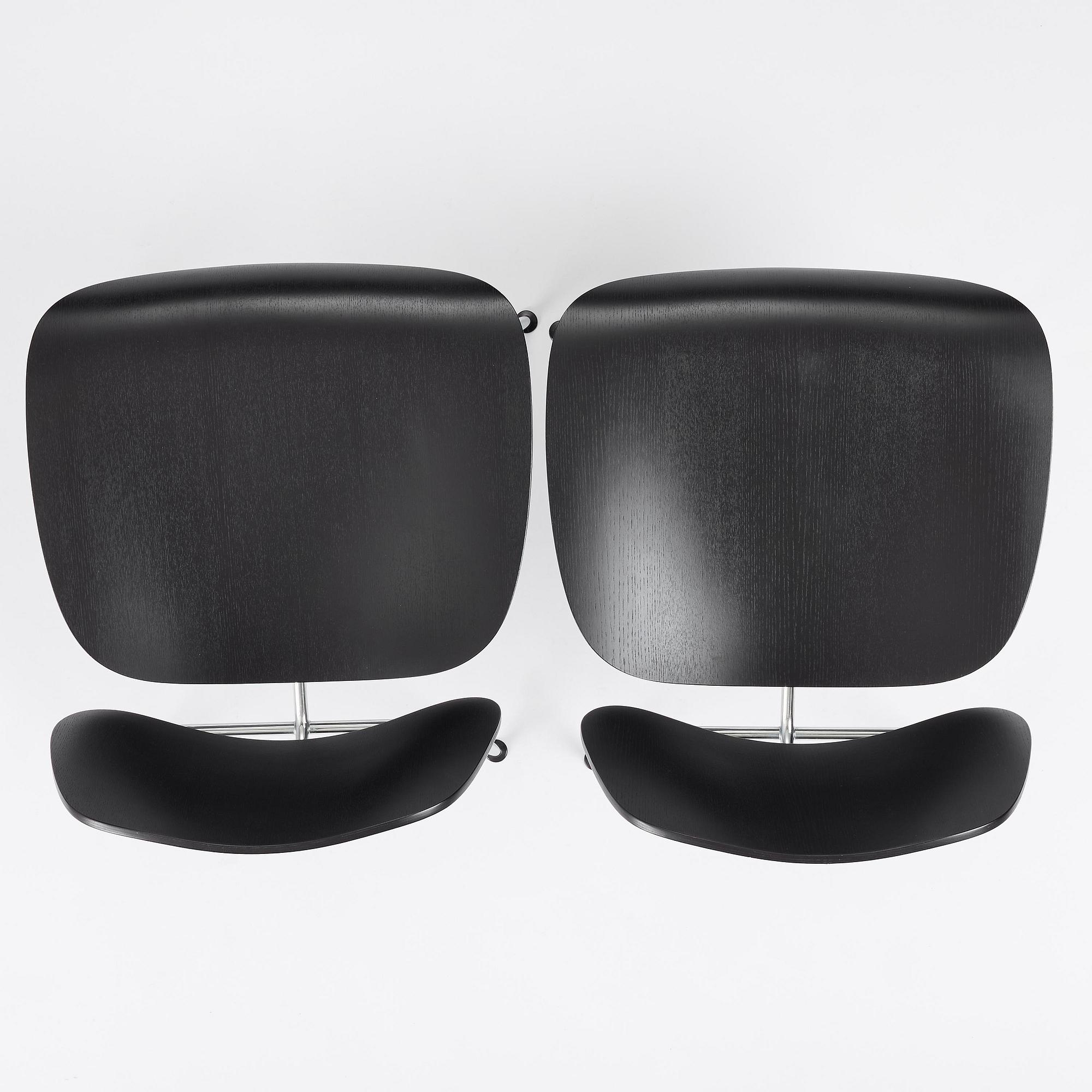 Charles & Ray Eames, a pair of "DCM" chairs, Vitra, 1997.