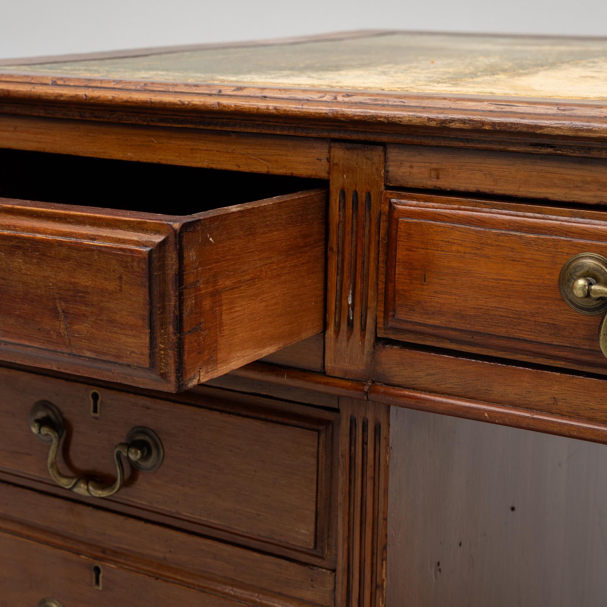A 20th century writing desk, England.