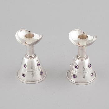 A pair of candleholders by Tage Göthlin in silver for Tesi, Gothenburg, year 1956. Weight in tot 580 gram.