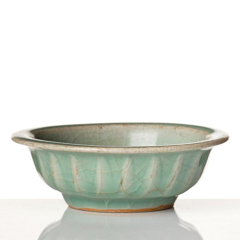 A celadon glazed double fish bowl, Yuan dynasty.