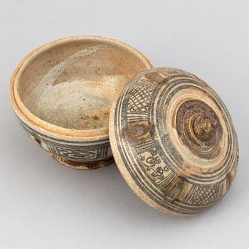 A Sawankhalok jar with cover and a pale celadon glazed bowl for the South East Asian market.