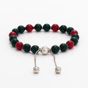 Gucci, a 'Boule Britt"' bracelet.
