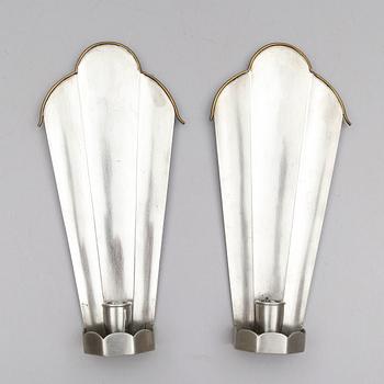 VÄGGLAMPETTER, 1 par, tenn, Firma Svenskt Tenn, stämpel 1925.