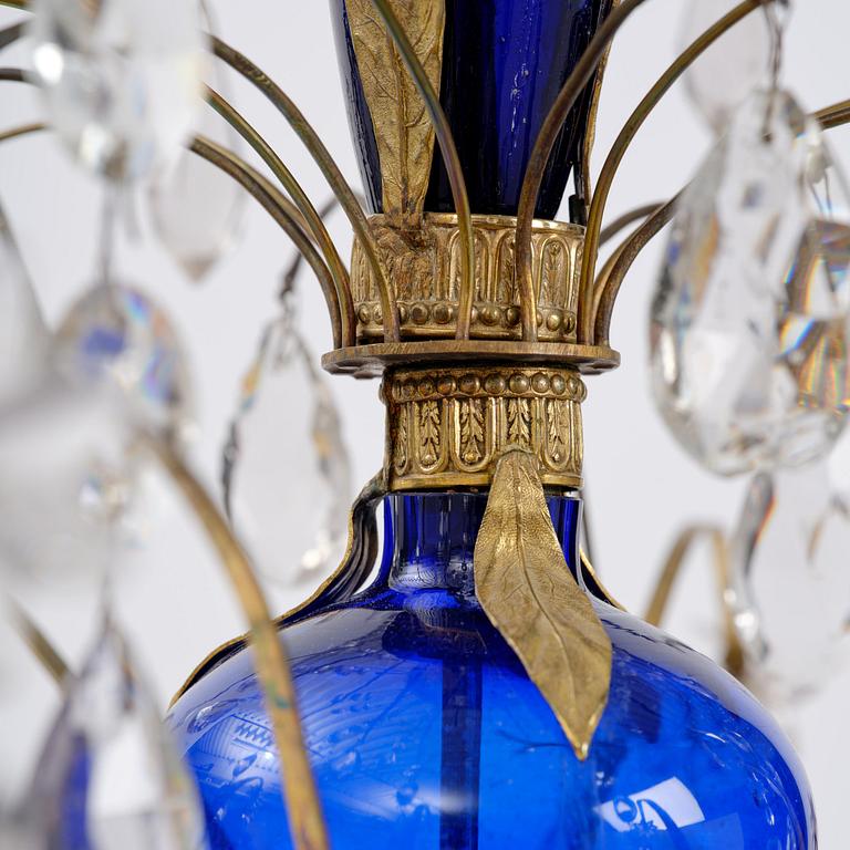 A Russian / Northern European Louis XVI-style gilt brass and blue glass six-branch chandelier, 19th century.