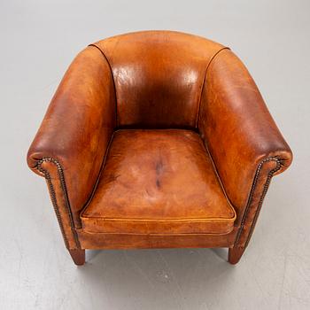 A leather easy chair later part of the 20th century.