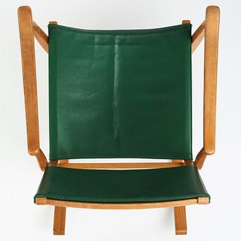 Josef Frank, gungstol, Firma Svenskt Tenn, modell 2220, 1950/60-tal.