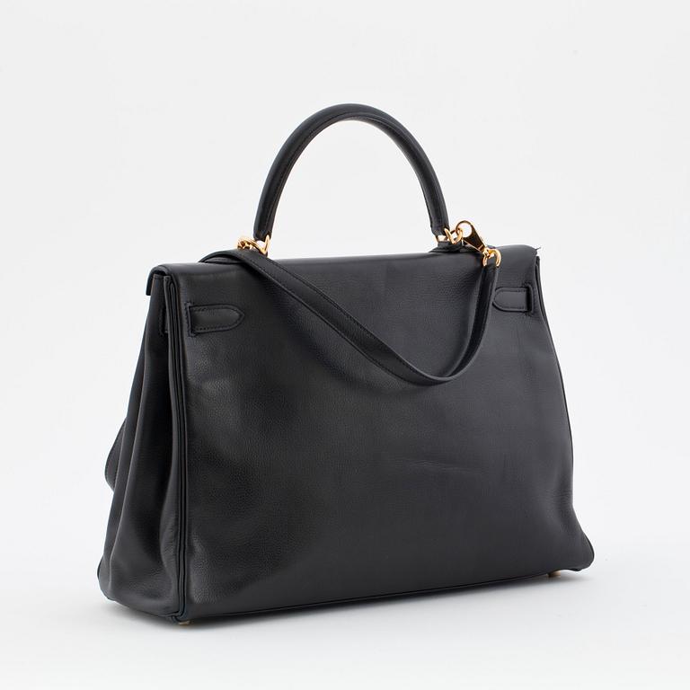 HERMÈS, a black calf leather handbag, "Kelly 35".