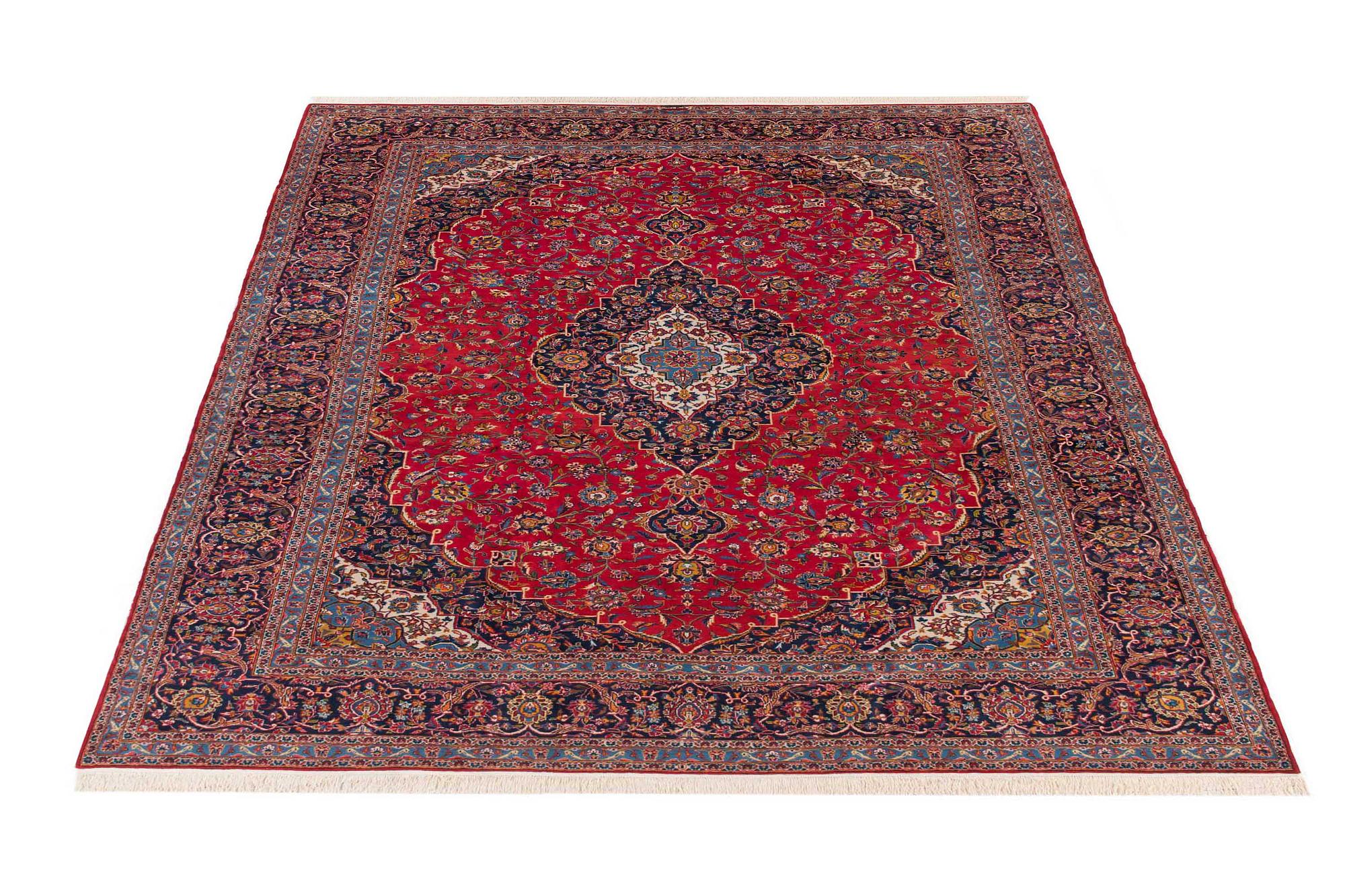 An old Keshan carpet ca 410 x 295 cm.