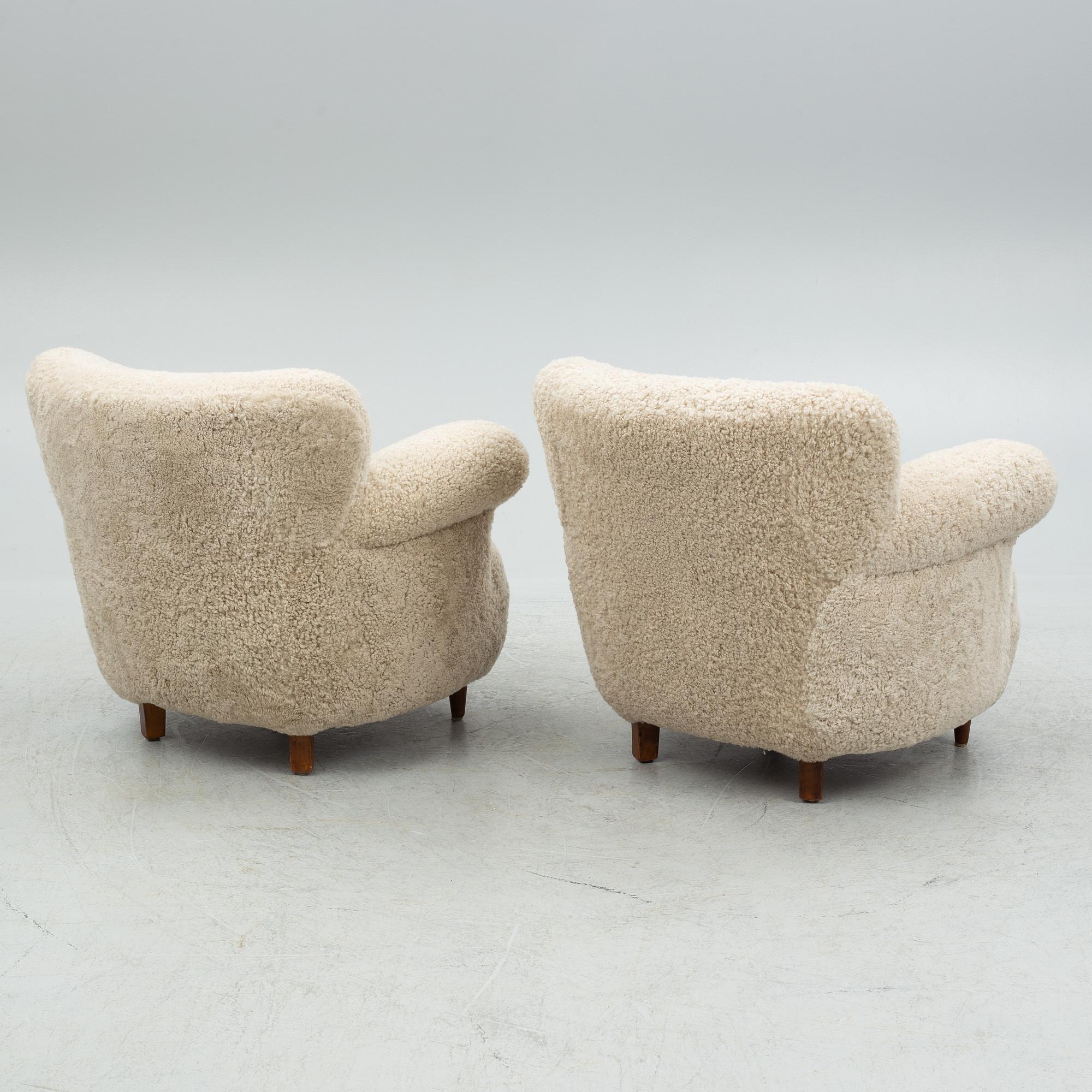 A pair of Swedish Modern easy chairs, mid 20th century.
