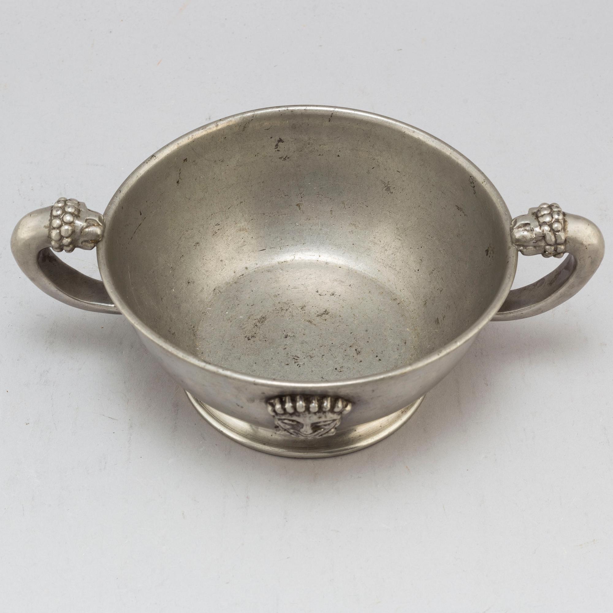 ANNA PETRUS, probaly, a pewter bowl with lionhead handles, Svenskt Tenn, Stockholm 1927.