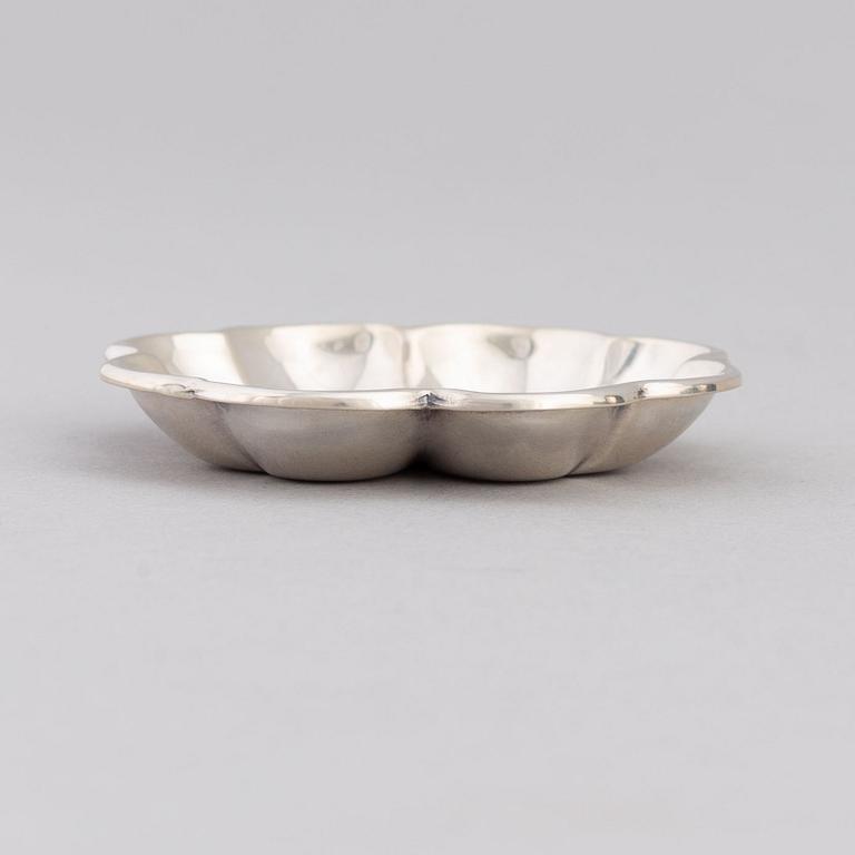 De Grisogono, a set of five silver dishes, Chopard, Switzerland.