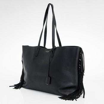 Saint Laurent, a 'Sac shopping' bag.