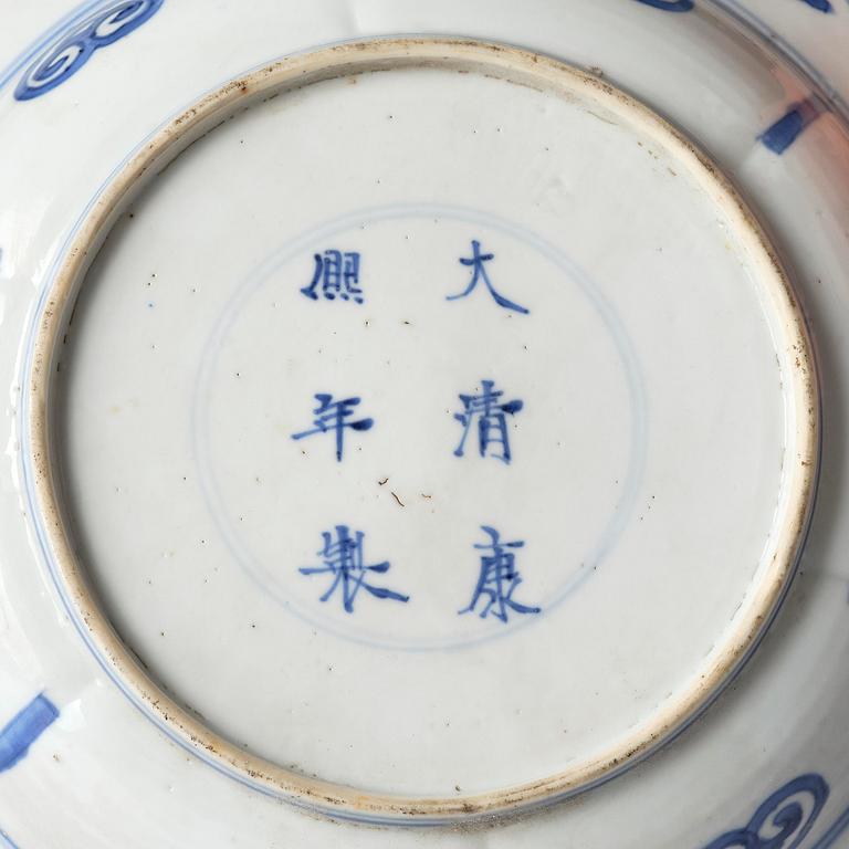 A blue and white dish, Qing dynasty, Kangxi mark and of the period (1662-1722).