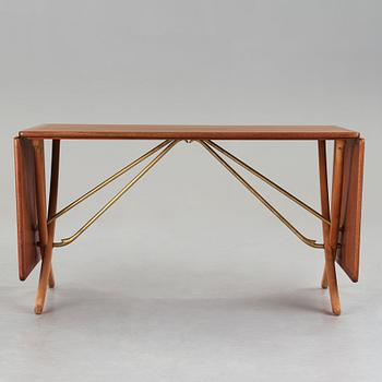 Hans J. Wegner, a teak, beech and brass dining table, model "AT-314", for Andreas Tuck, Denmark 1950-60's.