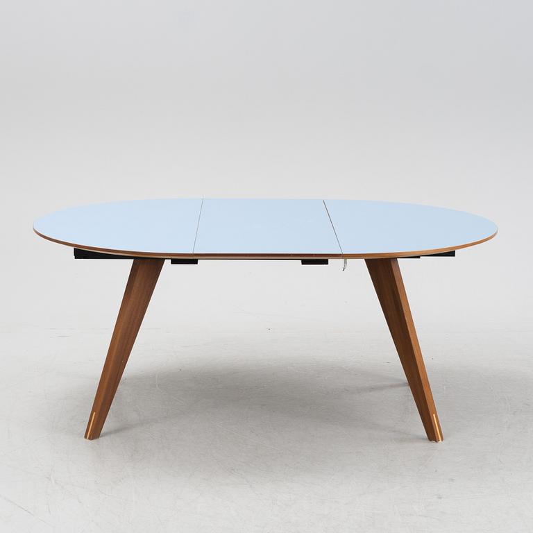 A 'New Mood' dining table by Michel H Nielsen for Bolia.