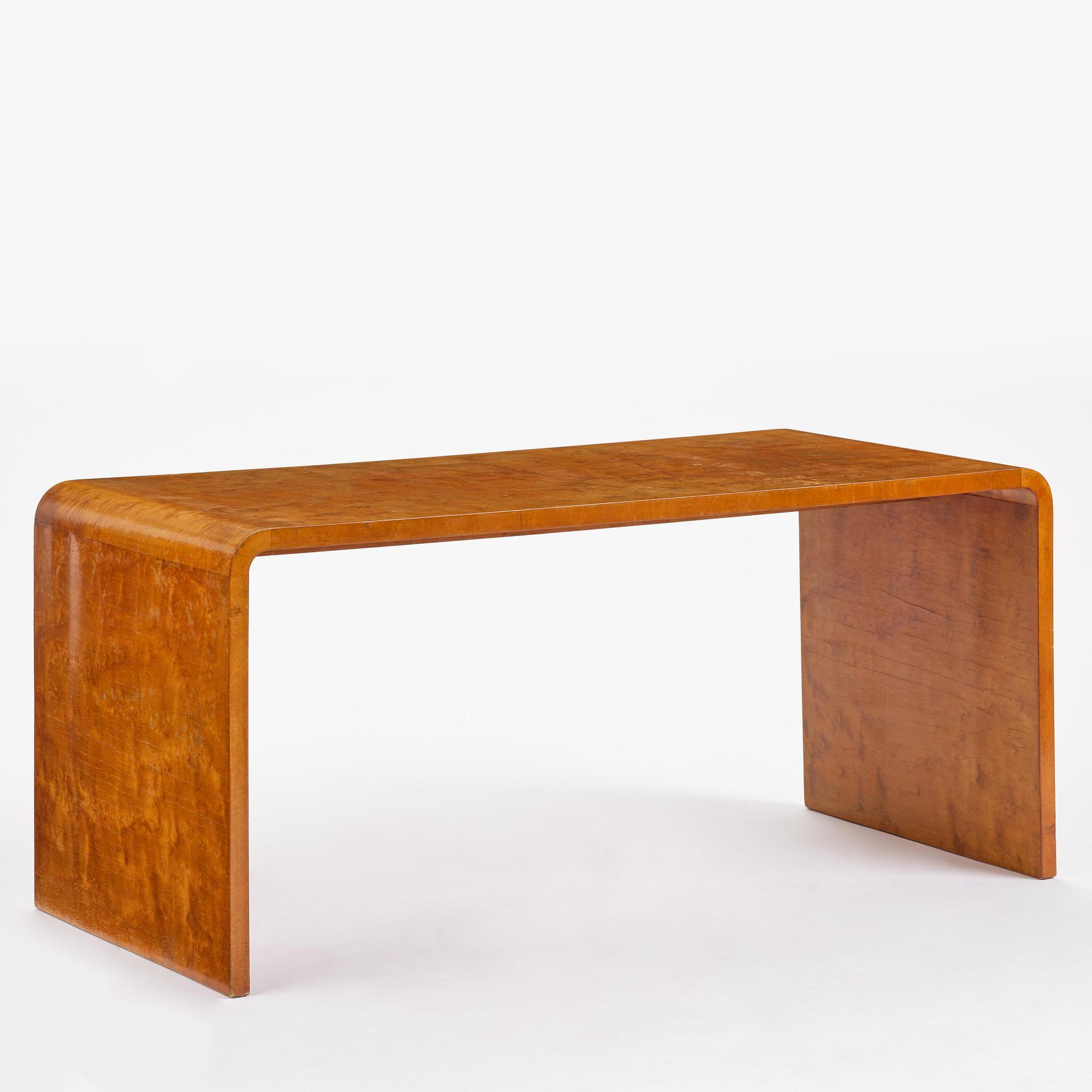 Swedish Modern, a birch veneered coffee table, 1930s-40s.