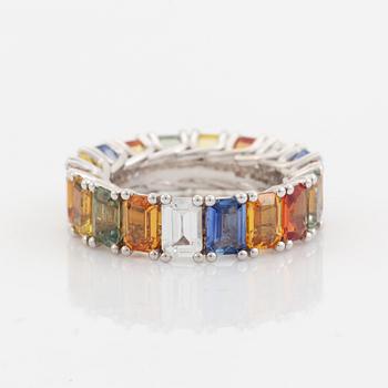 Emerald cut multi coloured sapphire ring.