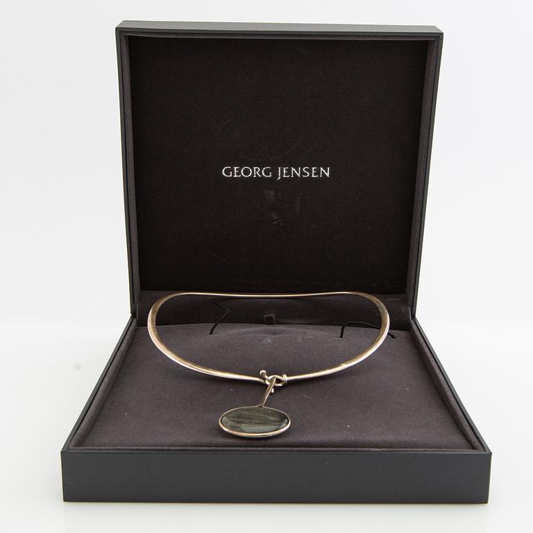 Vivianna Torun Bülow-Hübe, Necklace with pendant and a pair of earrings by Georg Jensen, Denmark, sterling silver and stone.