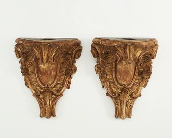 A pair of Swedish Rococo 18th century gilt wood consoles.