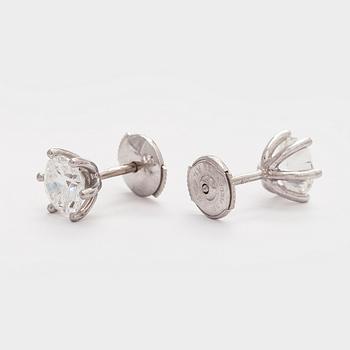 Bucherer, a pair of 18K white gold earrings with brilliant-cut diamond. SJL-certificate.