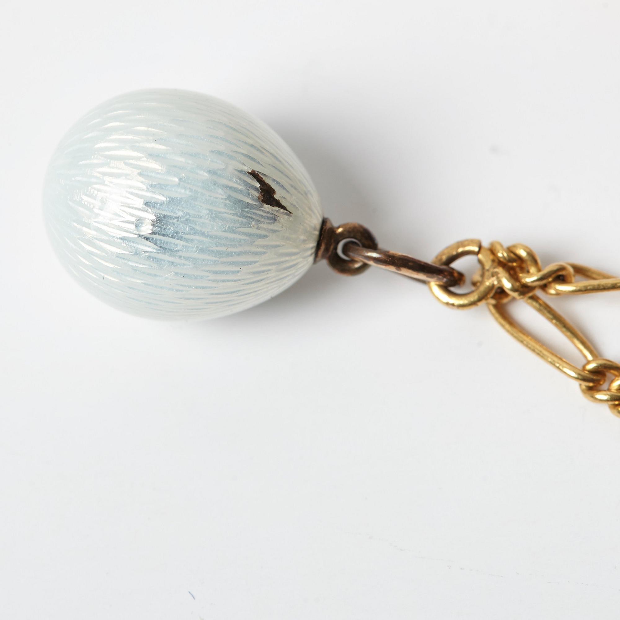 FABERGÉ, HALSKEDJA MED 9 MINIATYRPÅSKÄGG, guld, emalj MM, OLIKA VERKMÄSTARE S:T PETERSBURG 1899-1908.