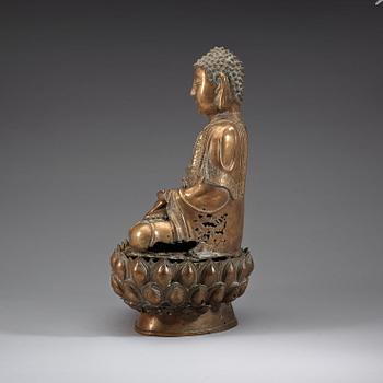 A polished bronze buddha, Ming dynasty (1368-1644).