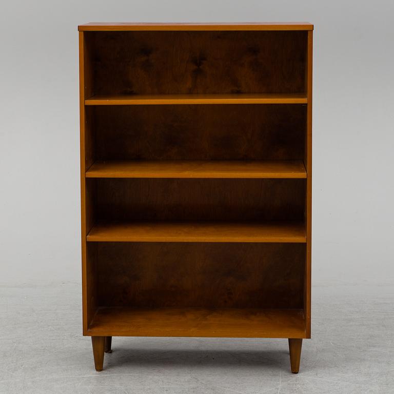 A 1940s walnut veneered shelf.