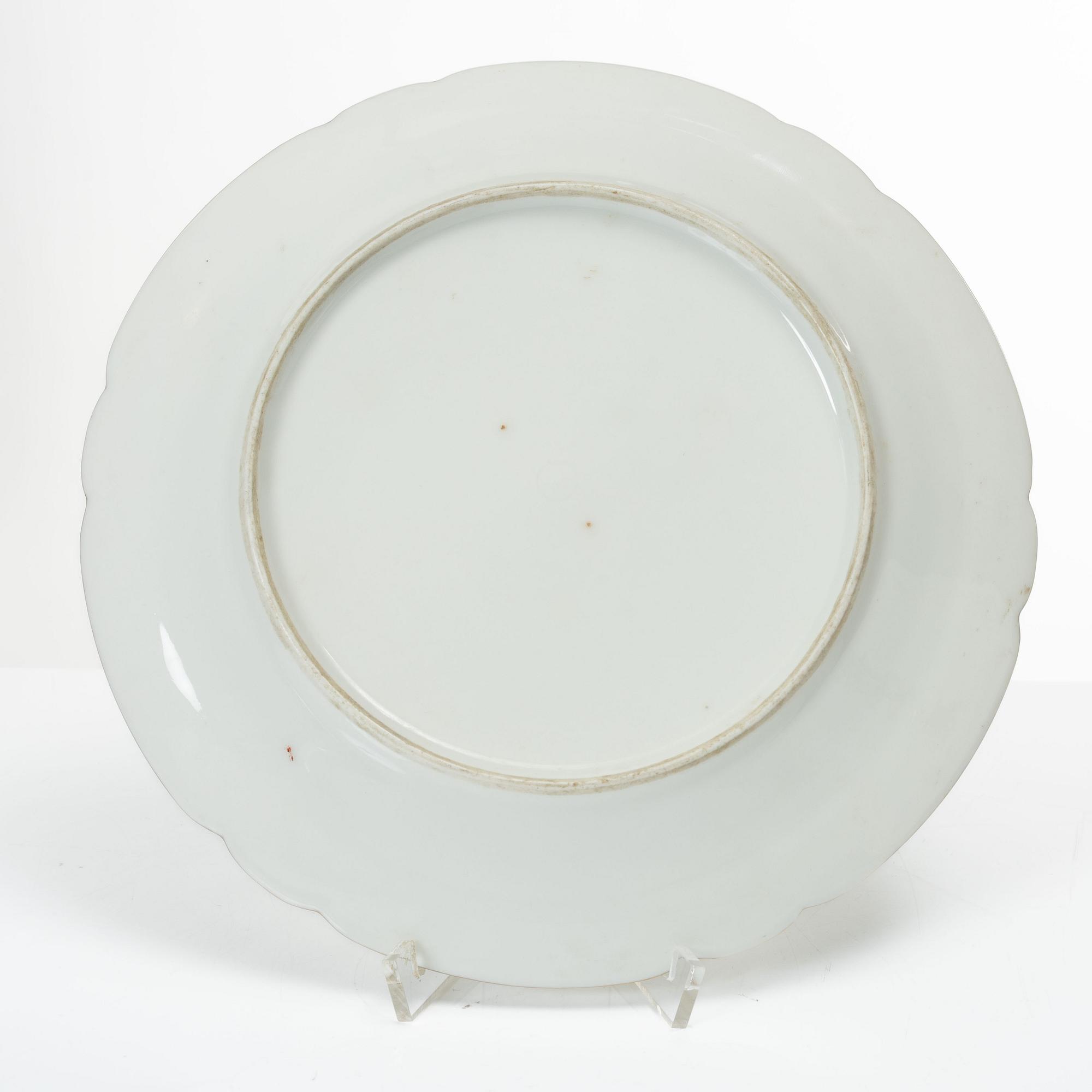 A group of three armorial dinner plates, presumably France, late 19th century.
