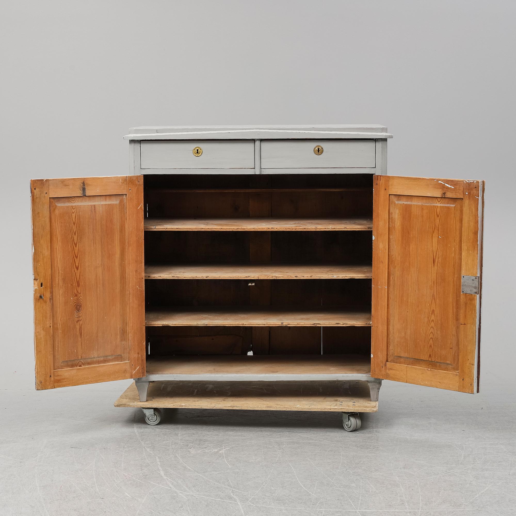 A mid 19th Century painted cupboard.