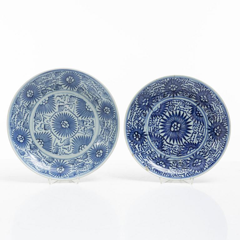 Two similar blue and white porcelain plates, 19th century.