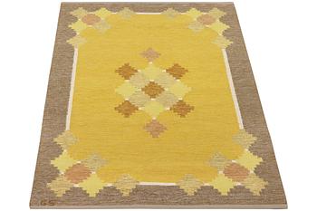 A flat weave carpet, signed GS, c. 205 x 139 cm.