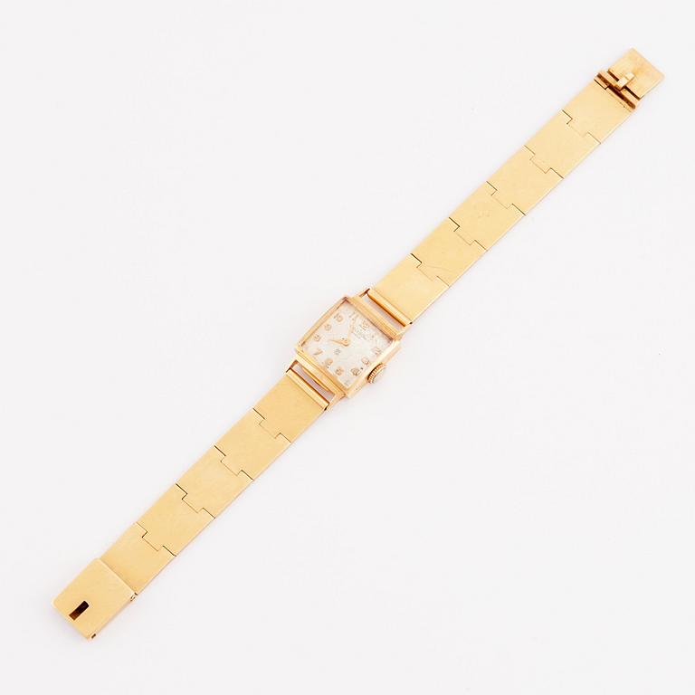 armband 18K guld, Lund 1955 med ett armbandsur Universal.