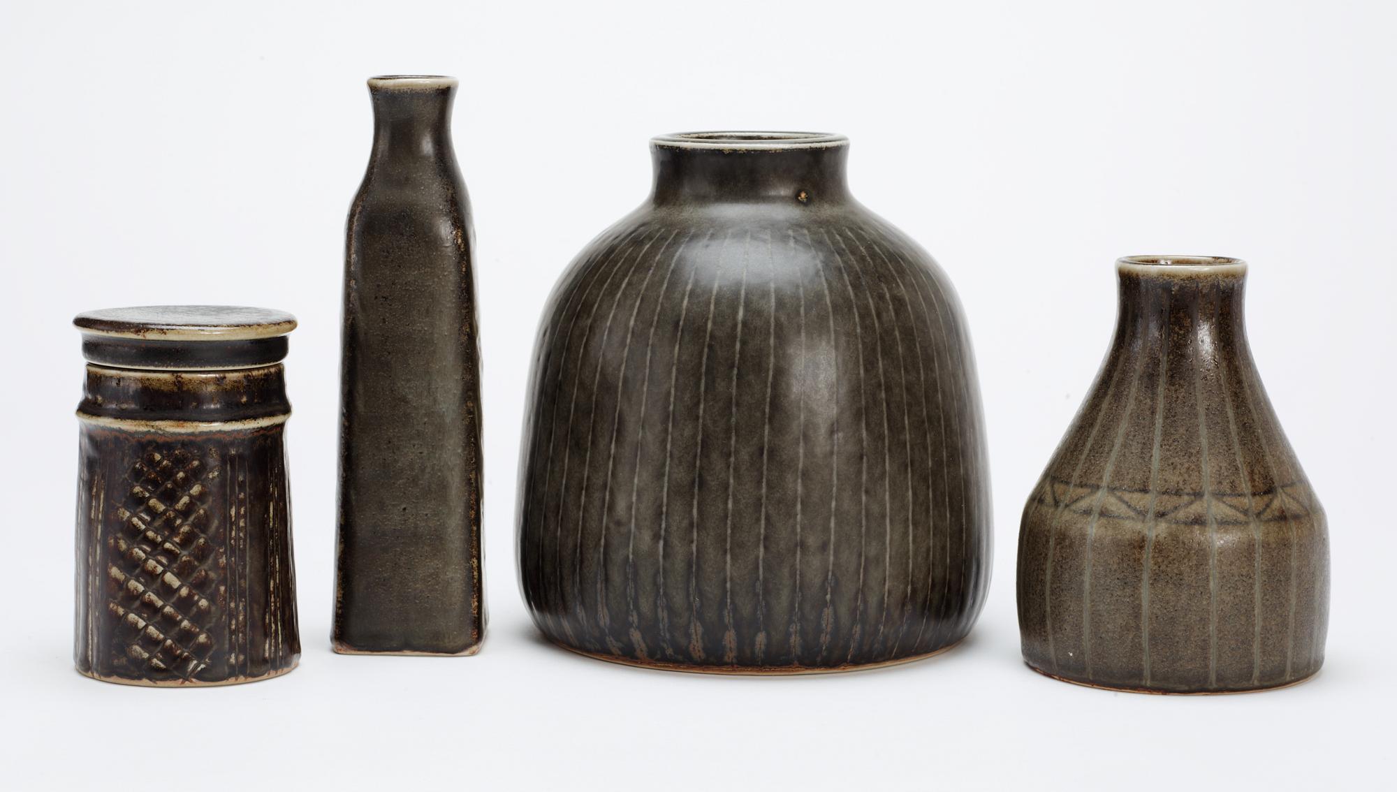 A Carl-Harry Stålhane stoneware lidded jar and three vases, Rörstrand.