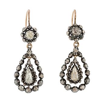 A pair of silver and 14K gold earrings with rose-cut diamonds.