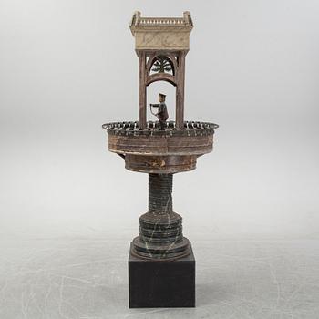 A painted and richly decorated plate garden fountain, late 19th century.