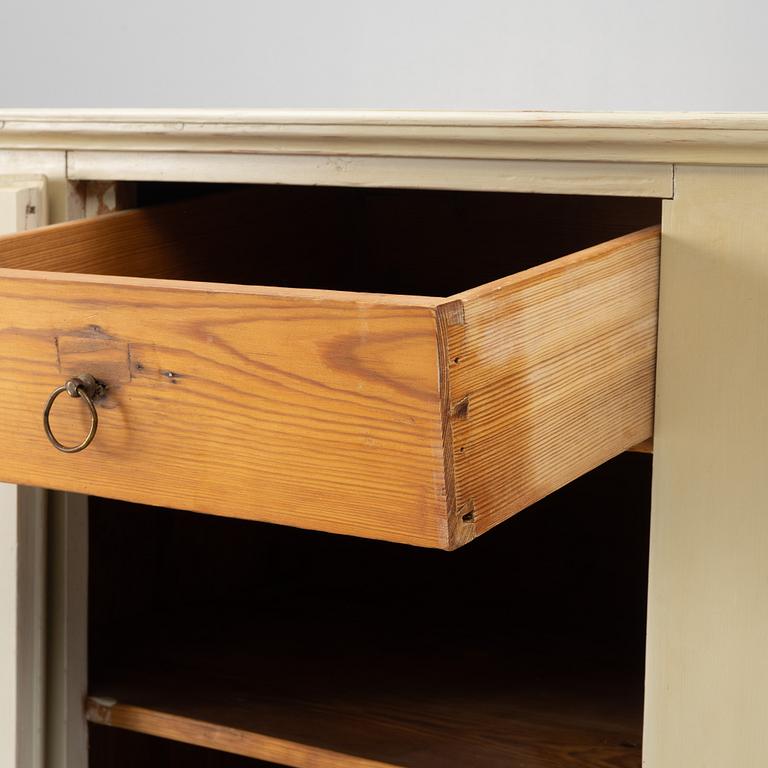 A Gustavian cupboard, early 19th century.